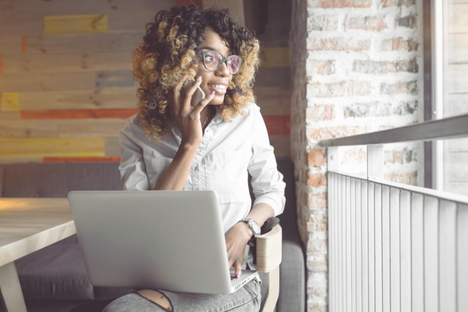 Instructor supporting student during budget planning exercise
